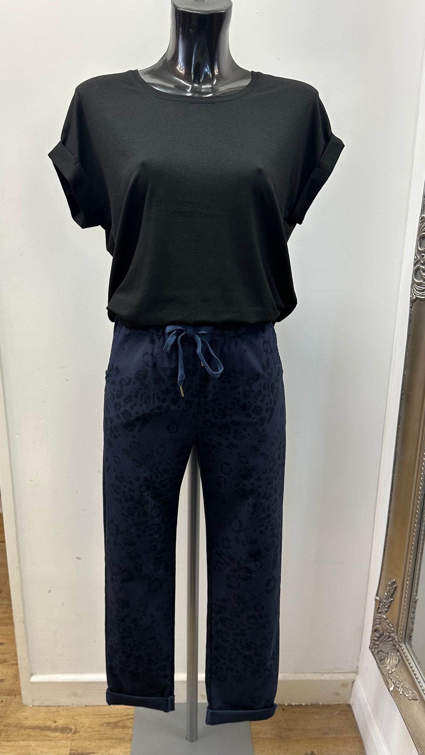 Navy animal print trousers