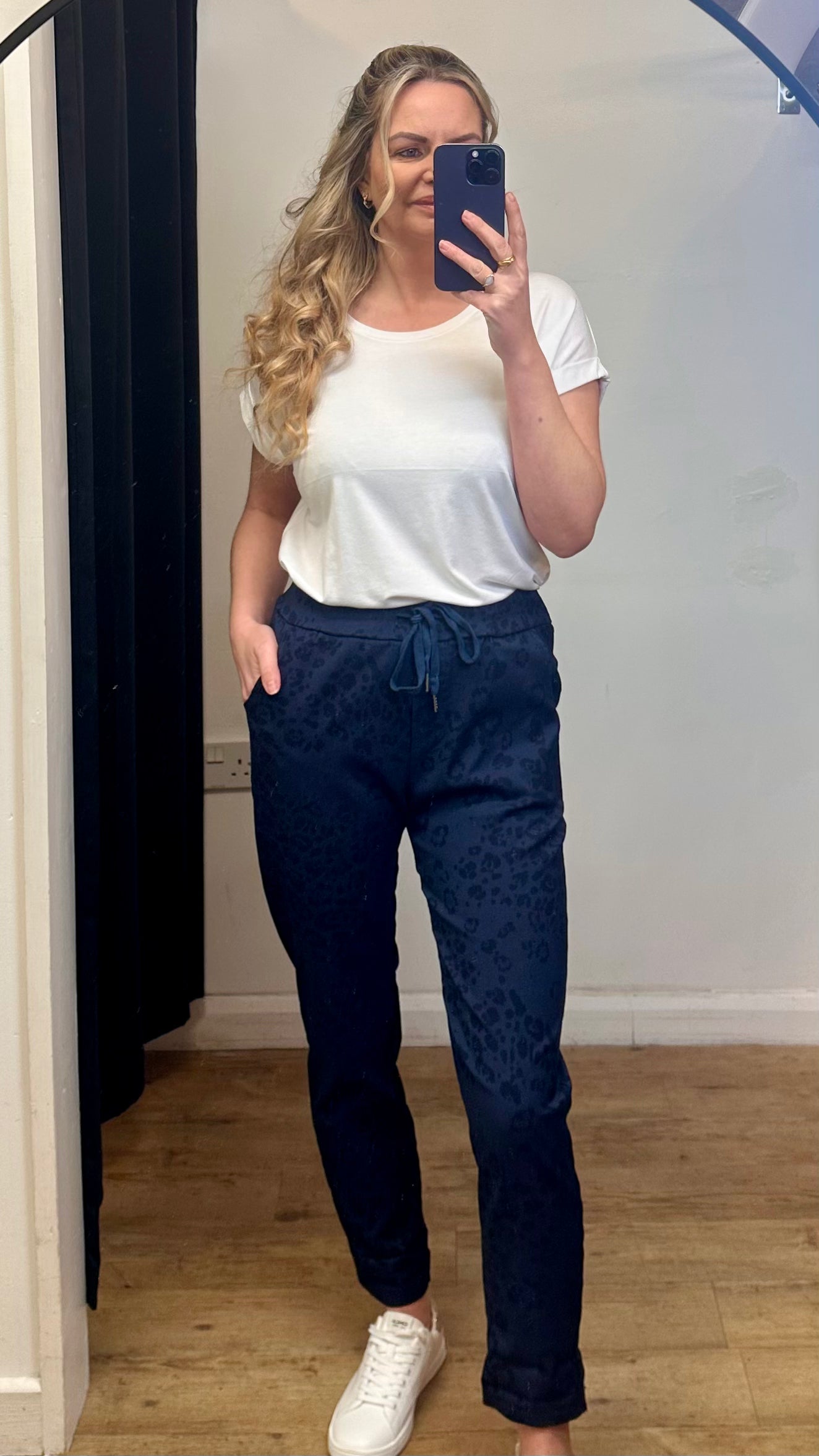 Navy animal print trousers