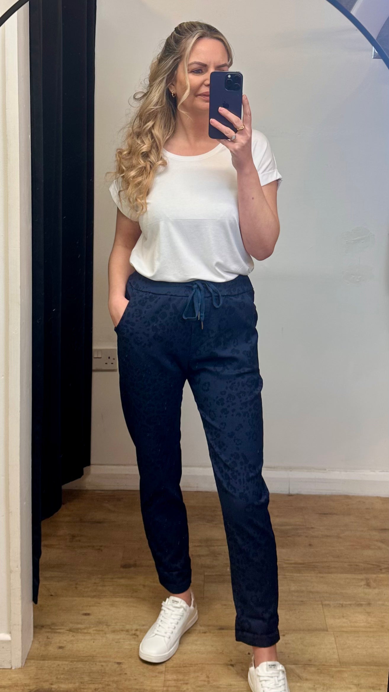 Navy animal print trousers