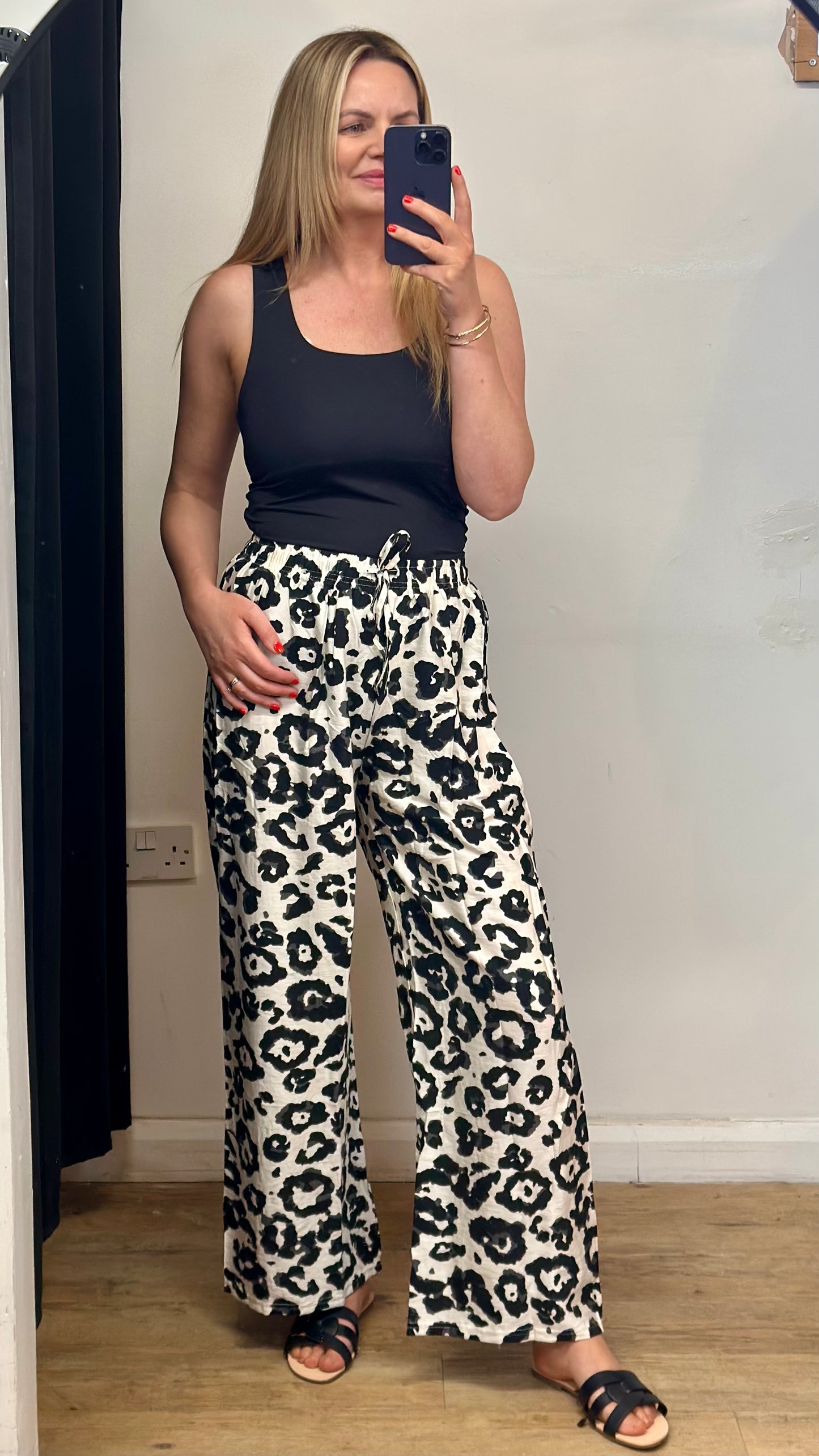 Animal print wide leg trousers - Black colour