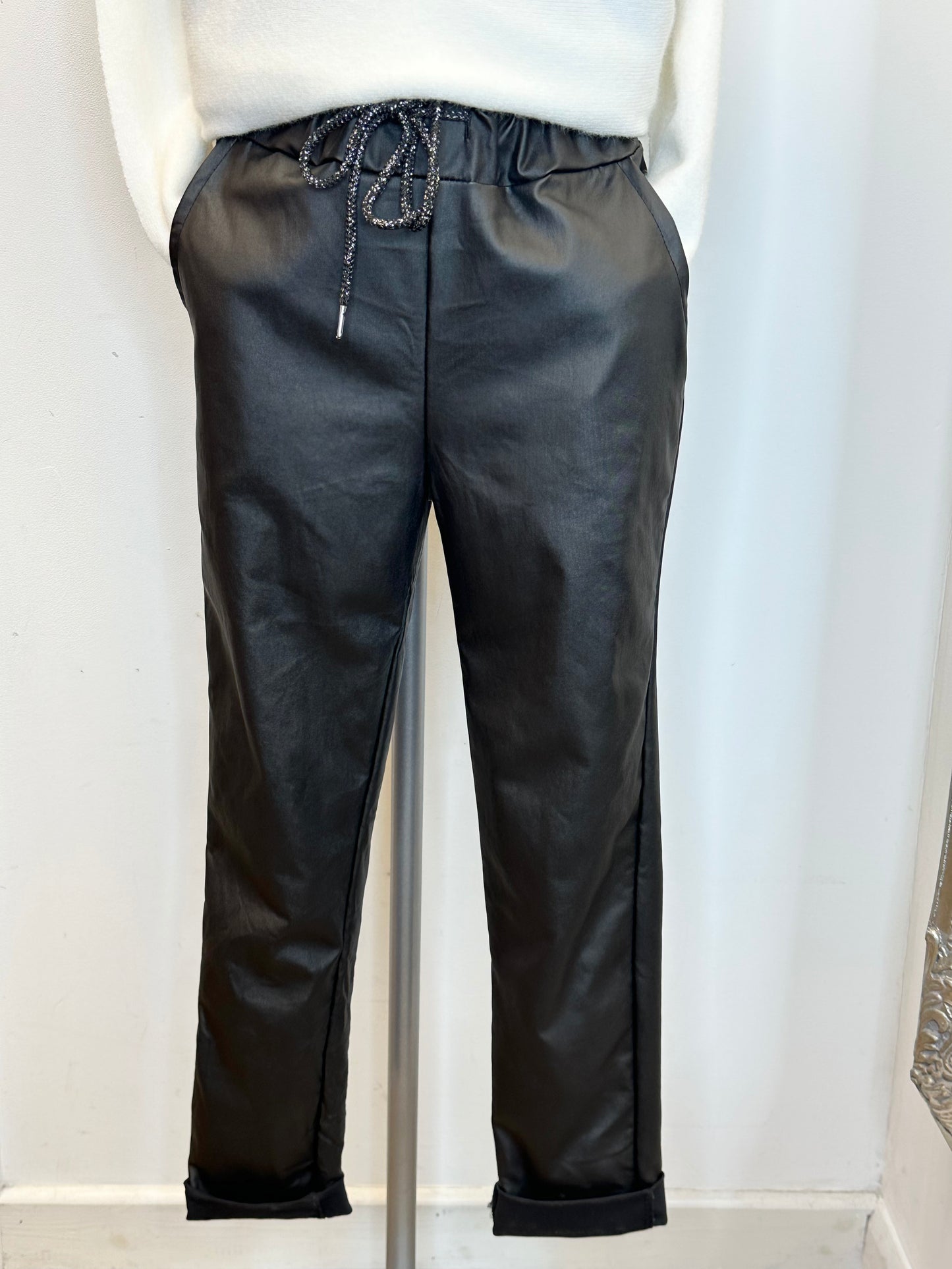 Black faux leather stretch trousers