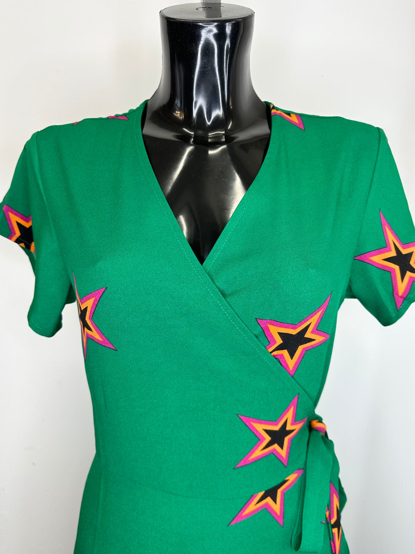 Green star print wrap dress