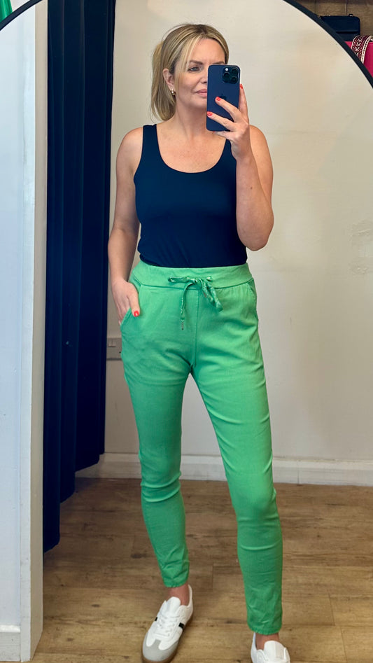 Green stretch trousers
