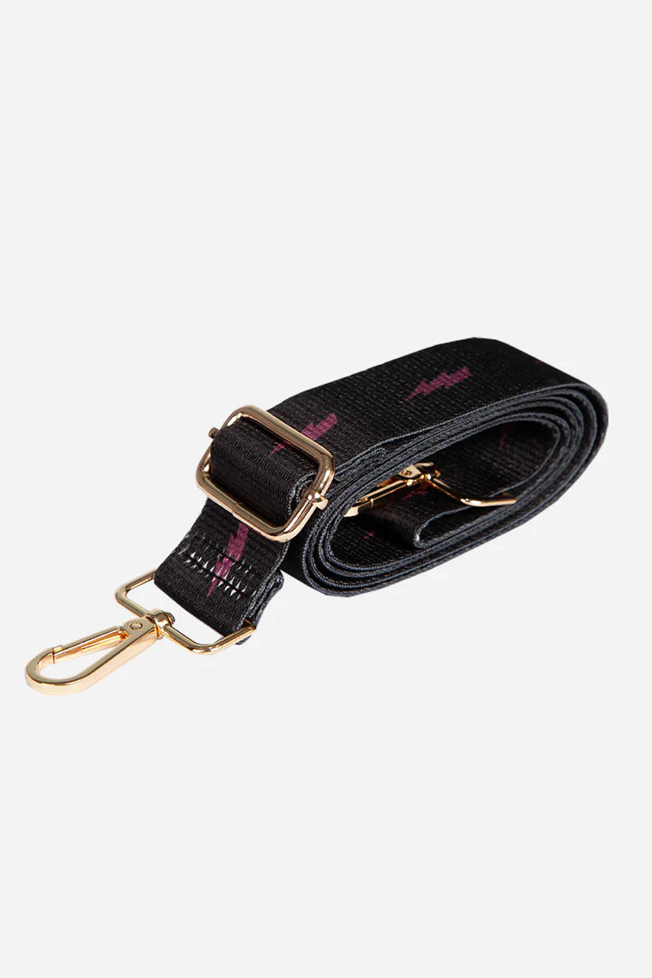 Black bag strap with purple lightning bolt print