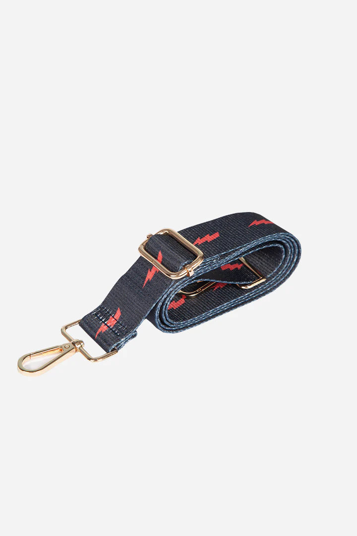 Navy bag strap with red lightning bolt print