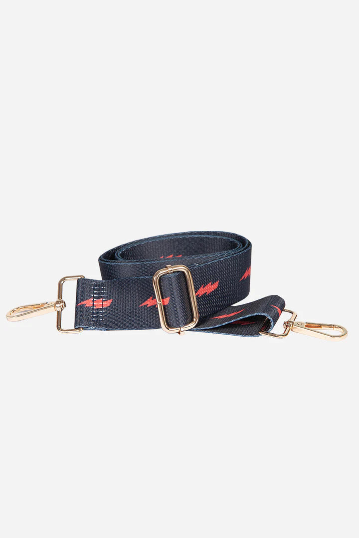 Navy bag strap with red lightning bolt print